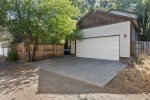 Two car garage and driveway for parking, alley entrance